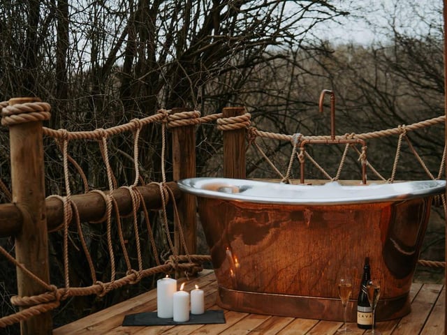 Soak up your surroundings with the star of the show: the outside copper bath.