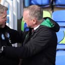 Peterborough United Manager Grant McCann embraces Stoke City manager Michael O'Neill before kick-off. Photo: Joe Dent/theposh.com.