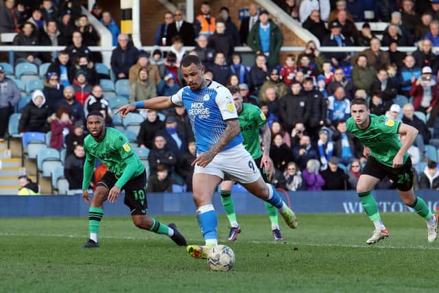 Jonson Clarke-Harris of Peterborough United scores a late penalty to equalise against Stoke City. Photo: Joe Dent/theposh.com.