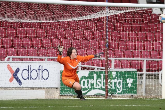 Faye Noble is unable to convert from the spot, spooning over the crossbar.