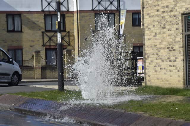 Burst water main outside Premier Inn, Bridge Street EMN-220314-112311009