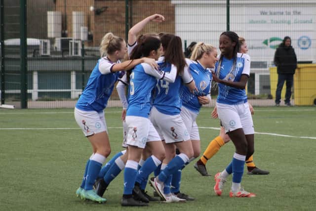 Posh Women celebrate their late equaliser against Leek Town. Photo: Gary Reed.