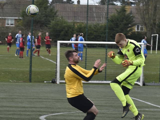Action from Netherton United Deeping Rangers Reserves (yellow). Photo: David Lowndes.
