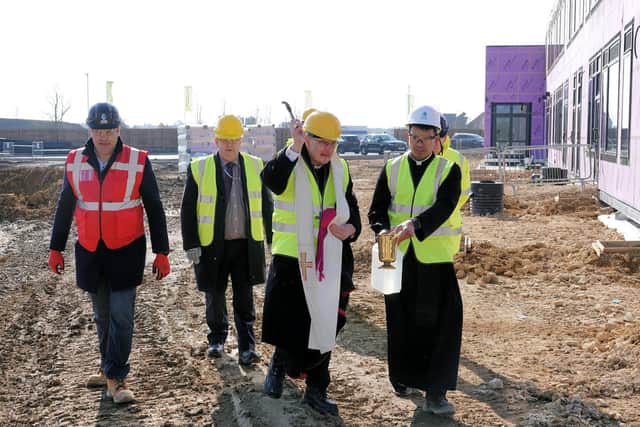 Bishop Alan Hopes’ blessing of the site on March 8 marks the latest stage in the building of the school.