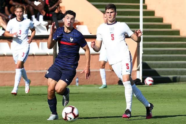 Ronnie Edwards in action for England Under 19s against France.