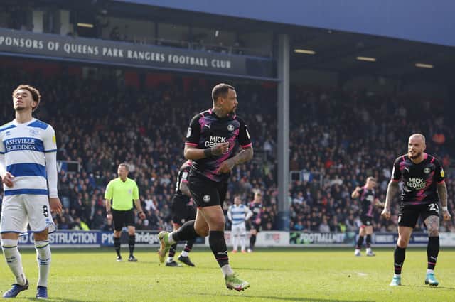 Jonson Clarke-Harris of Peterborough United celebrates scoring the equalising goal against Queens Park Rangers.