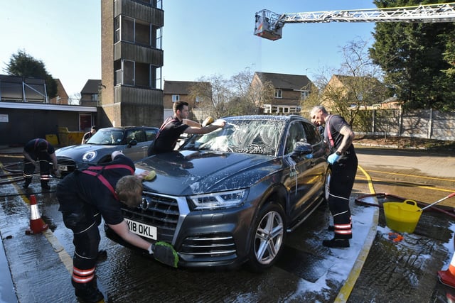 Stanground and Dogsthorpe fire fighters doing their annual charity car wash at Stanground Fire Station. EMN-220319-101432009