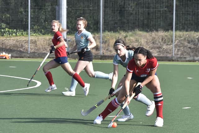 Tierney Augustine (red) scored for City of Peterborough Ladies against Bishop's Stortford.