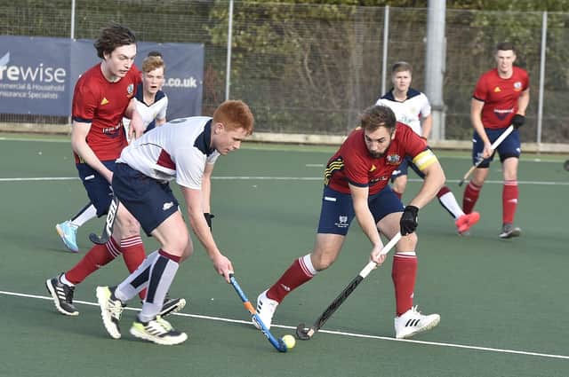 Joe Finding (red) scored for City of Peterborough at Bowden.
