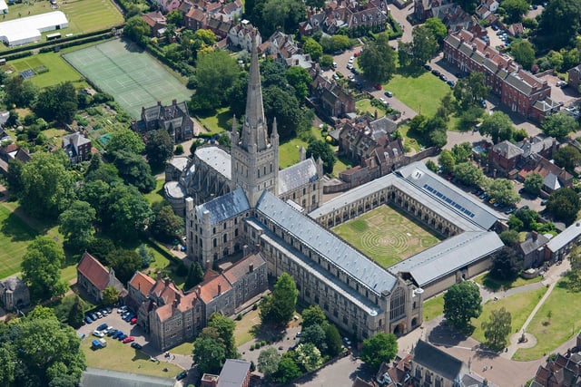 This second image of Norwich Cathedral shows the cathedral in 2014, with strange pattern in the grass in the cloister. These marks are not buried archaeology, but marks left by the set of the film Tulip Fever.