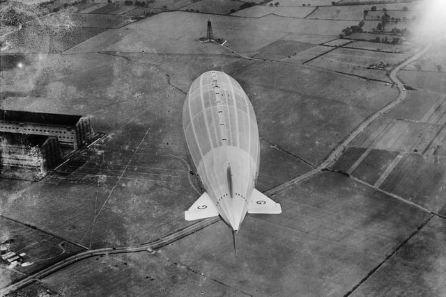 The British airship R101 was a rigid airship built by the Air Ministry at the Royal Airship Works, Cardington. Its maiden flight was on the 14th October 1929 which started with a short circuit over Bedford. Unfortunately, almost a year later in the early hours of the 5th of October 1930 the airship crash landed in France, on its maiden overseas flight, killing 48 of the 54 passengers on board. (Photo: Historic England)