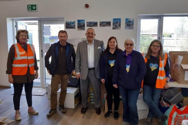 eterborough City Council cabinet member for digital services and transformation Cllr Marco Cereste visiting the East of England Showground where donations for Ukraine are being stored.