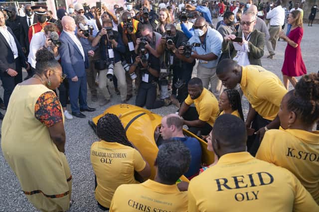 The Duke and Duchess of Cambridge meet the Jamaican bobsled team during their visit to Trenchtown in Kingston, Jamaica, on day four of their tour of the Caribbean on behalf of the Queen to mark her Platinum Jubilee. Picture date: Tuesday March 22, 2022. EMN-220323-125709005