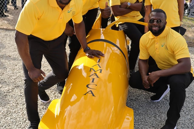Members of Jamaica's National bobsleigh team ahead of a visit by the Duke and Duchess of Cambridge to Trench Town, the birthplace of reggae in Kingston, Jamaica, on day four of their tour of the Caribbean on behalf of the Queen to mark her Platinum Jubilee. Picture date: Tuesday March 22, 2022. EMN-220323-125657005