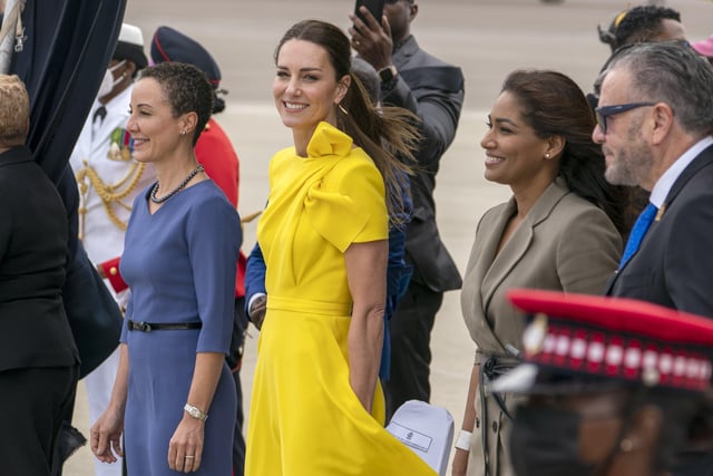 The Duchess of Cambridge with Jamaica's Minister of Foreign Affairs and Foreign Trade Kamina Johnson-Smith (left) and Lisa Hanna (right) at Norman Manley International Airport in Kingston, Jamaica, on day four of their tour of the Caribbean on behalf of the Queen to mark her Platinum Jubilee. Picture date: Tuesday March 22, 2022. EMN-220323-125735005