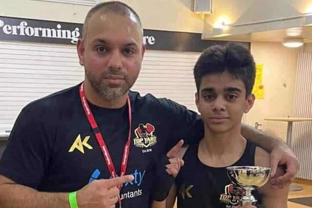 Proud father and coach Bilal Javed with son Adam.