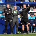 Peterborough United Manager Grant McCann and Assistant Manager Cliff Byrne on the touchline at Queens Park Rangers. Photo: Joe Dent.