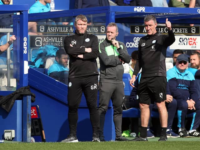 Peterborough United Manager Grant McCann and Assistant Manager Cliff Byrne on the touchline at Queens Park Rangers. Photo: Joe Dent.