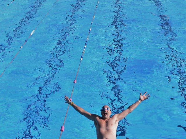Opening of the Lido - Chris Allen who has been using the pool every year since the 1960's EMN-220204-104120009