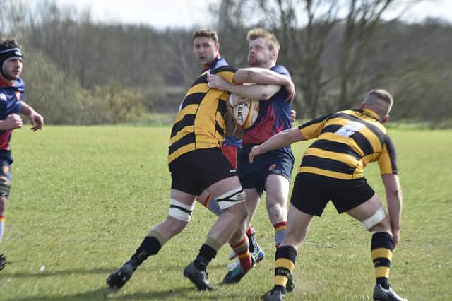 Rob Jacobs, scorer of two tries for Borough against Derby, is tackled. Photo: David Lowndes.