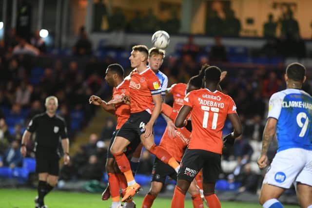 Frankie Kent wins a header for Posh against Luton. Photo: David Lowndes.