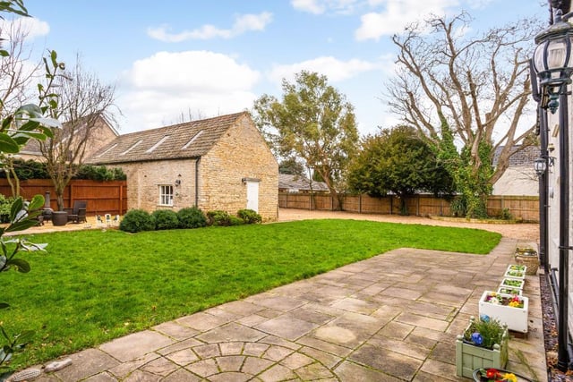 The property also has a detached stone barn inside the enclosed garden.