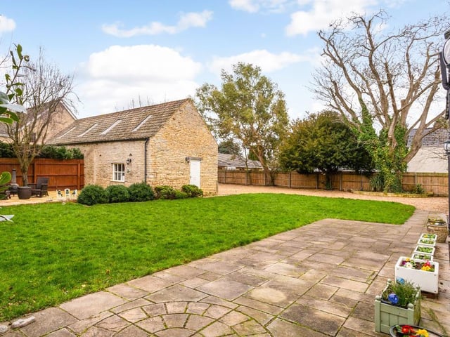 The property also has a detached stone barn inside the enclosed garden.