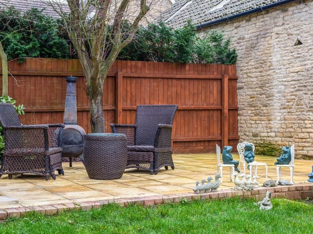 The garden lies to the rear of the house with a large lawn and gravelled driveway with electric gates.