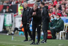 Peterborough United Manager Grant McCann encourages his players at Bristol City. Photo: Joe Dent/theposh.com