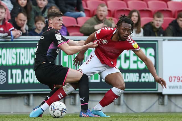 Ronnie Edwards of Peterborough United gets to grips with Antoine Semenyo of Bristol City. Photo: Joe Dent/theposh.com.