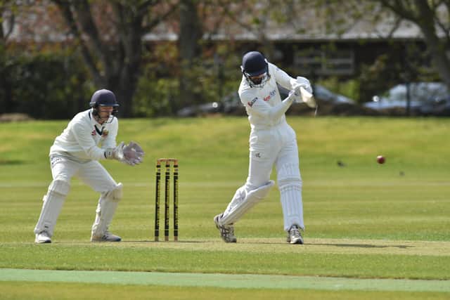 Josh Smith on his way to 72 for Peterborough Town against Wollaton. Photo: David Lowndes.