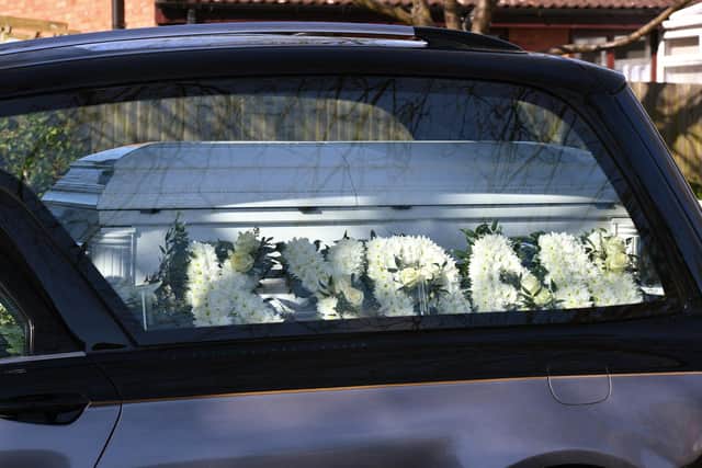The hearse displayed floral tributes for Kyran.