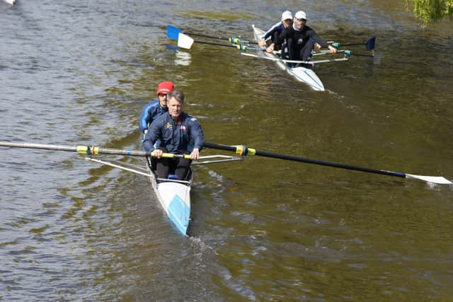 Damen Sanderson (stroke) and Chris Elder (bow) ahead of Dave Smith (stroke) and Ian Palmer (bow) on the Great Ouse.