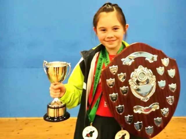 Hannah Saunders with the spoils of her success in Guernsey.