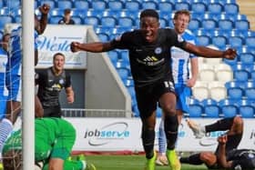 Jermaine Anderson celebrates his first Posh goal at Colchester in 2014.