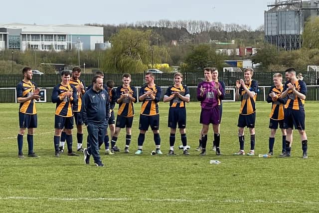 Glinton & Northborough Reserves team manager Tom Lea is applauded by his side after their Northants Sunday Vase Final win.