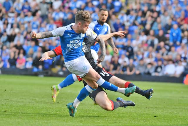 Sammie Szmodics scores for Posh against Blackburn. Photo: David Lowndes.