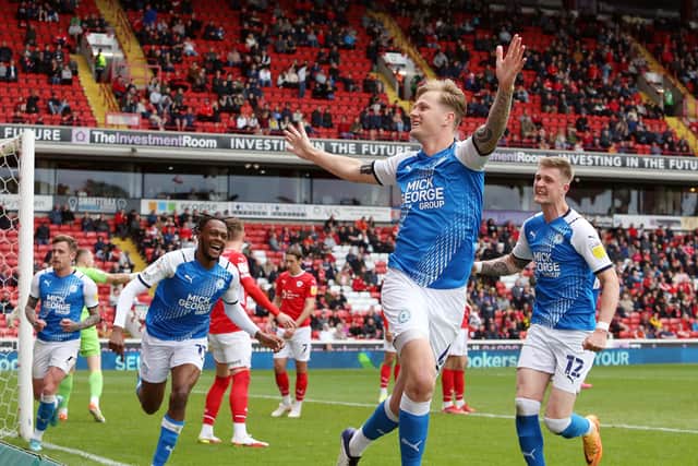Frankie Kent celebrates after the second Posh goal at Barnsley, thinking he had scored it when in fact Jack Taylor had headed the ball home! Photo: Joe Dent/theposh.com