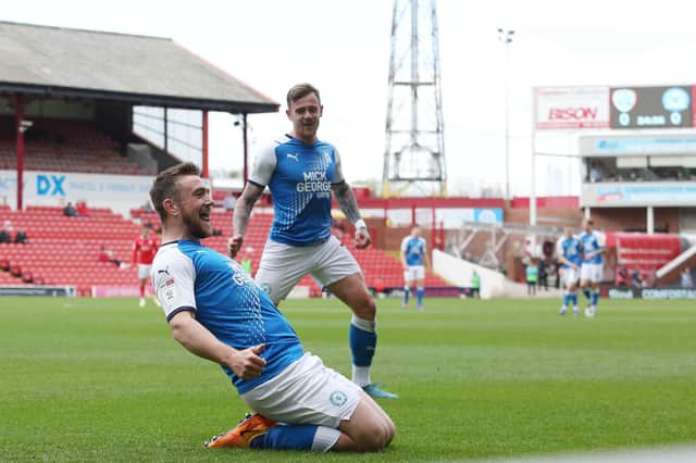 Jack Marriott of Peterborough United celebrates the opening goal of the game against Barnsley.