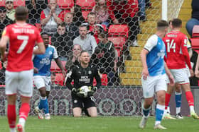 David Cornell of Peterborough United claims the ball against Barnsley. Photo: Joe Dent/theposh.com