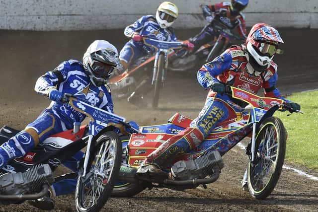 Simon Lambert (red helmet) in action for Panthers against King's Lynn. Photo: David Lowndes.