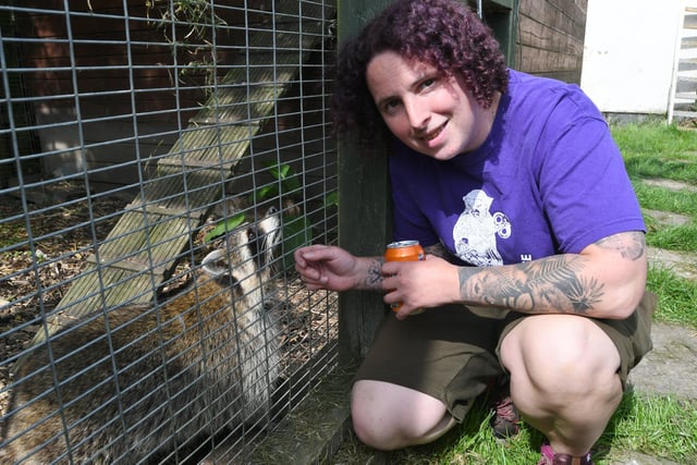 Open day at the Exotic Pets Refuge at Deeping St James. Site manager Caz Bruce with a raccoon EMN-220417-131410009
