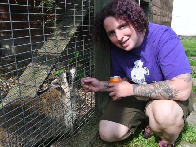 Open day at the Exotic Pets Refuge at Deeping St James. Site manager Caz Bruce with a raccoon EMN-220417-131410009