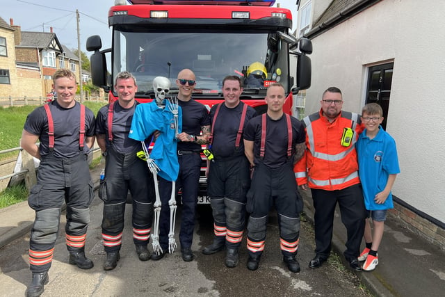 A crew from Cambridgeshire Fire and Rescue Service, who helped encourage the ducks down the river.
