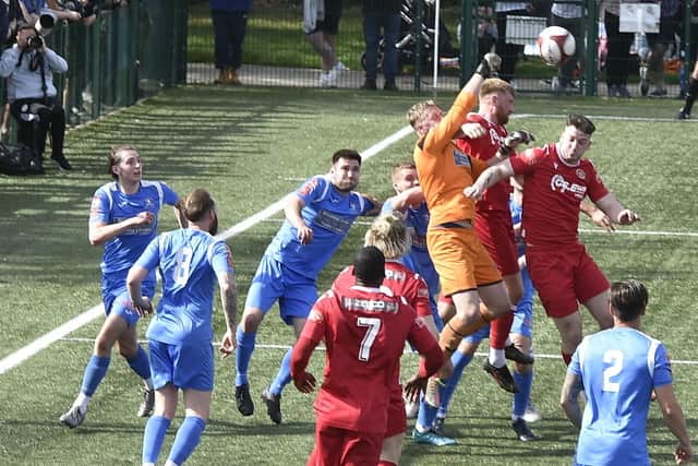 Action from Yaxley (blue) v Stamford AFC. photo: David Lowndes.