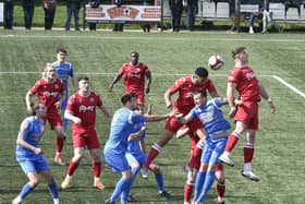 Action from Yaxley (blue) v Stamford AFC. photo: David Lowndes.