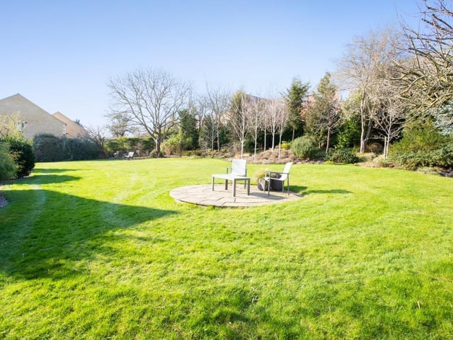 The property stands centrally within its substantial plot of 0.76 of an acre which includes a long driveway and wrap-around garden.