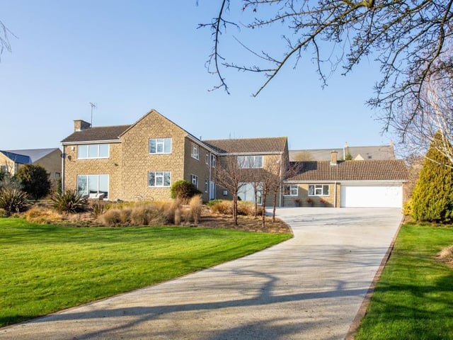 The property also benefits from driveway parking and a double garage.