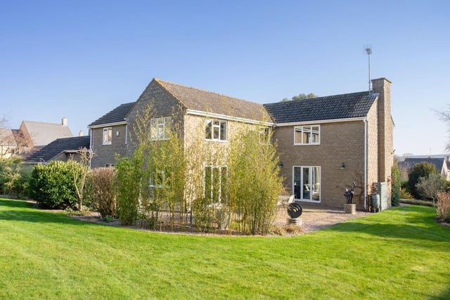The house has landscaped gardens within almost an acre plot.
