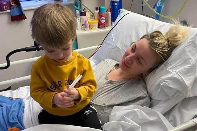 Sepsis survivor, Sadie Kemp, pictured with her son Hendrix, 2, is raising a huge amount of money for bionic fingers.